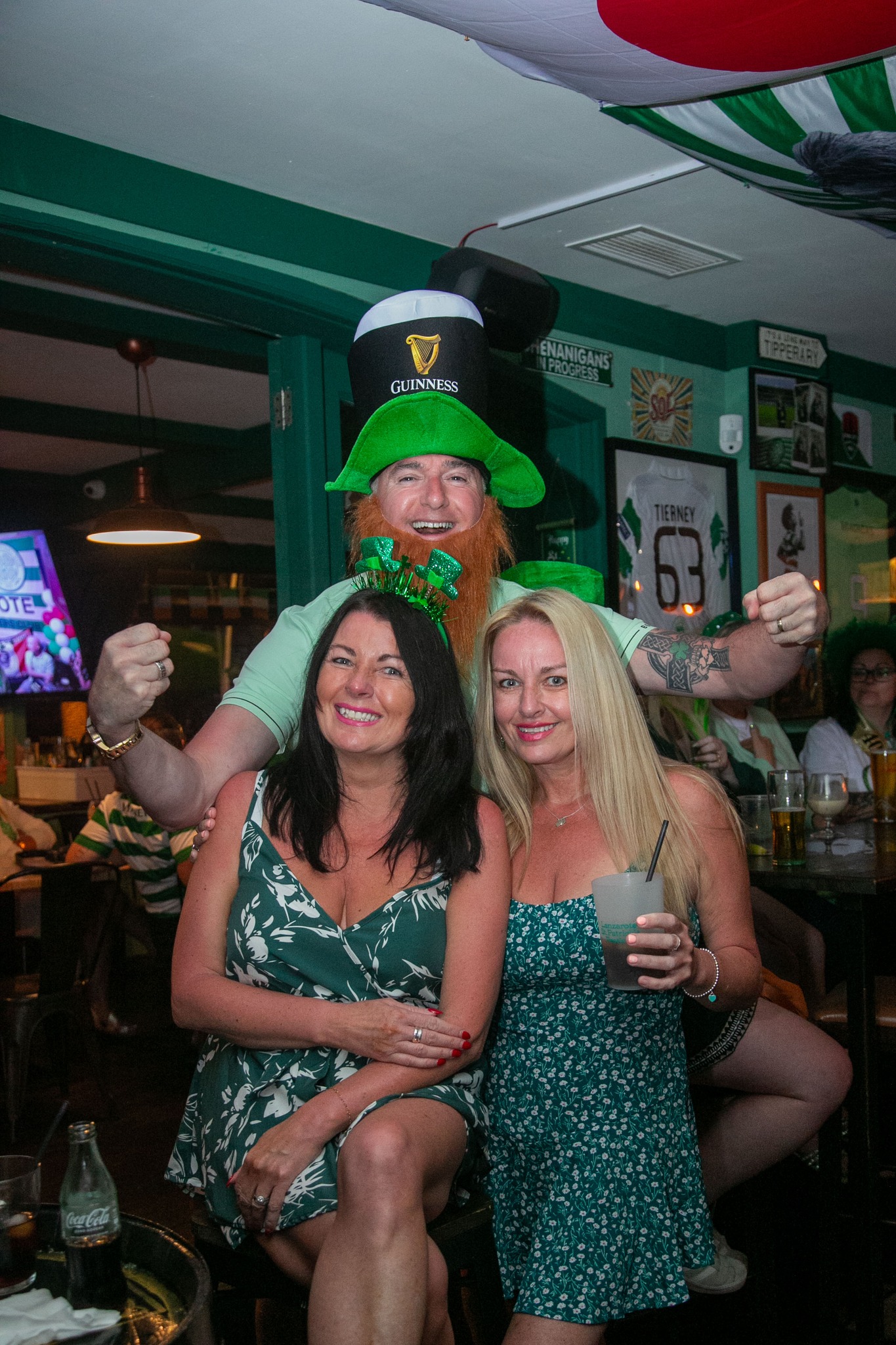 Group celebrating St Patrick's Day at Bar 67
